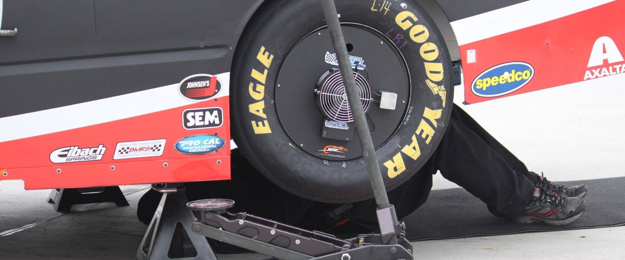 A car being worked on while Wheel Chill products are in use